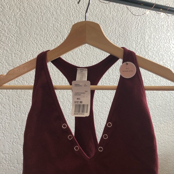 A brand new burgundy bodysuit with tag! - Picture 2 of 4
